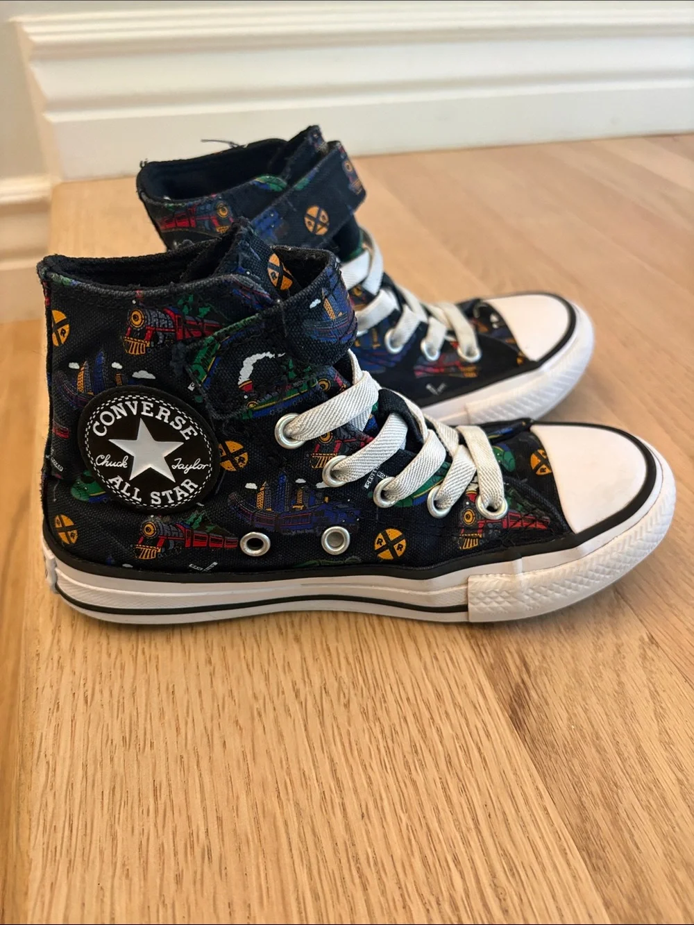 Kids Converse High-Top Sneakers in Black with Colorful Train Print